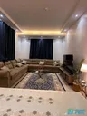 New furnished apartment in Al Khobar, Al Hamra district, with a city view, parking, and an electric elevator.
