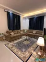 New furnished apartment in Al Khobar, Al Hamra district, with a city view, parking, and an electric elevator.