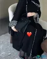 Used modest long women's abaya with hijab and small burnt brown handbag in all sizes.