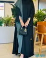 Used modest long women's abaya with hijab and small burnt brown handbag in all sizes.