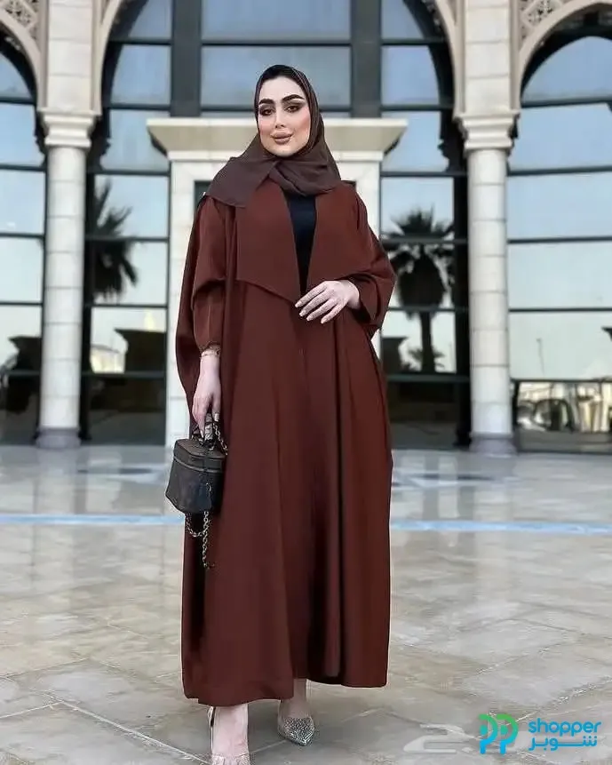 Used long brown women's abaya size XXL with hijab and small handbag.